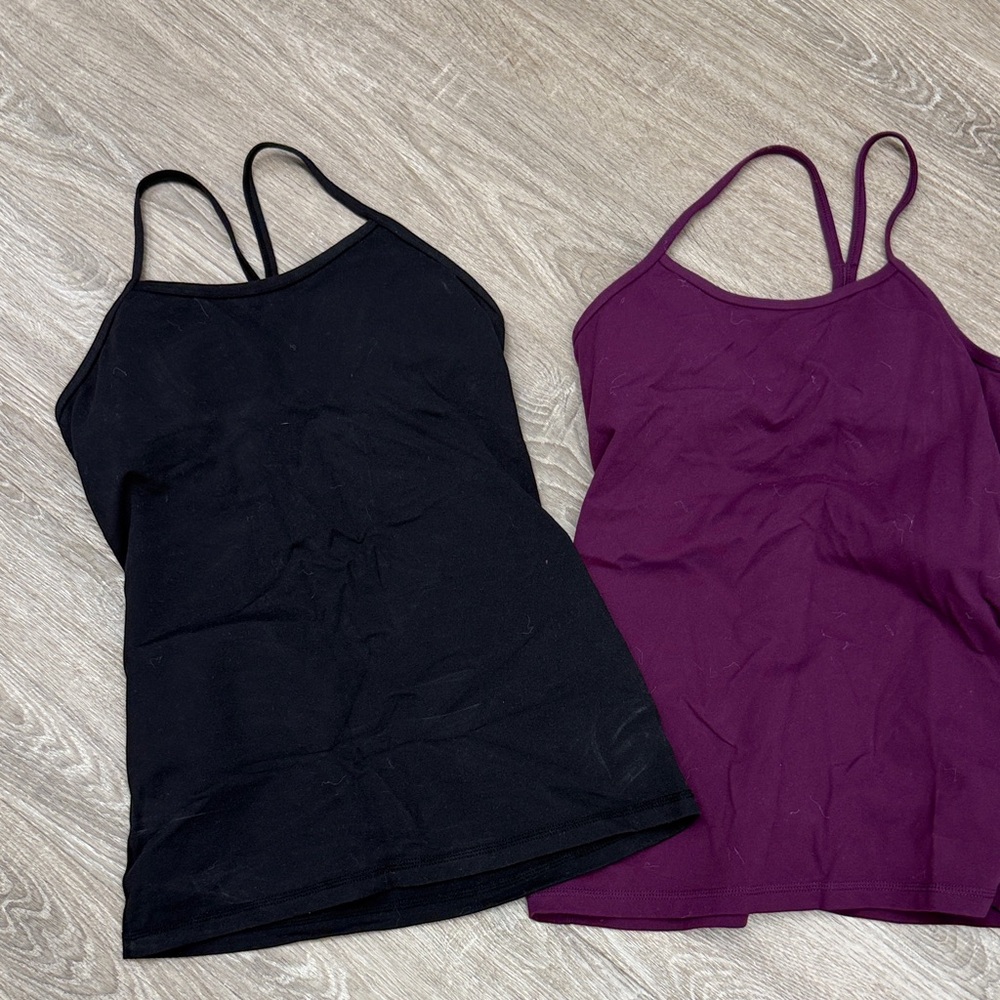 Tommy Bahama Black Tank &  Purple Tank both w/ built in bra.   Size small